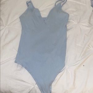 Light blue body suit
